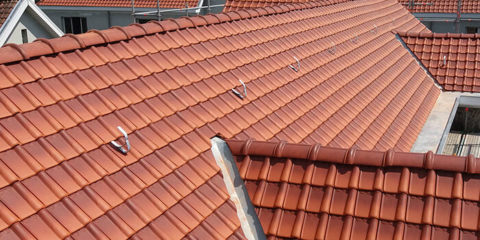 Toiture inclinée - Couverture en tuiles Toiture en tuiles réalisée par Construbel
